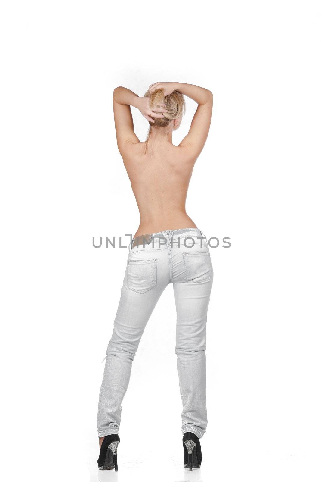 Sexy Female blonde shirtless in jeans Back view