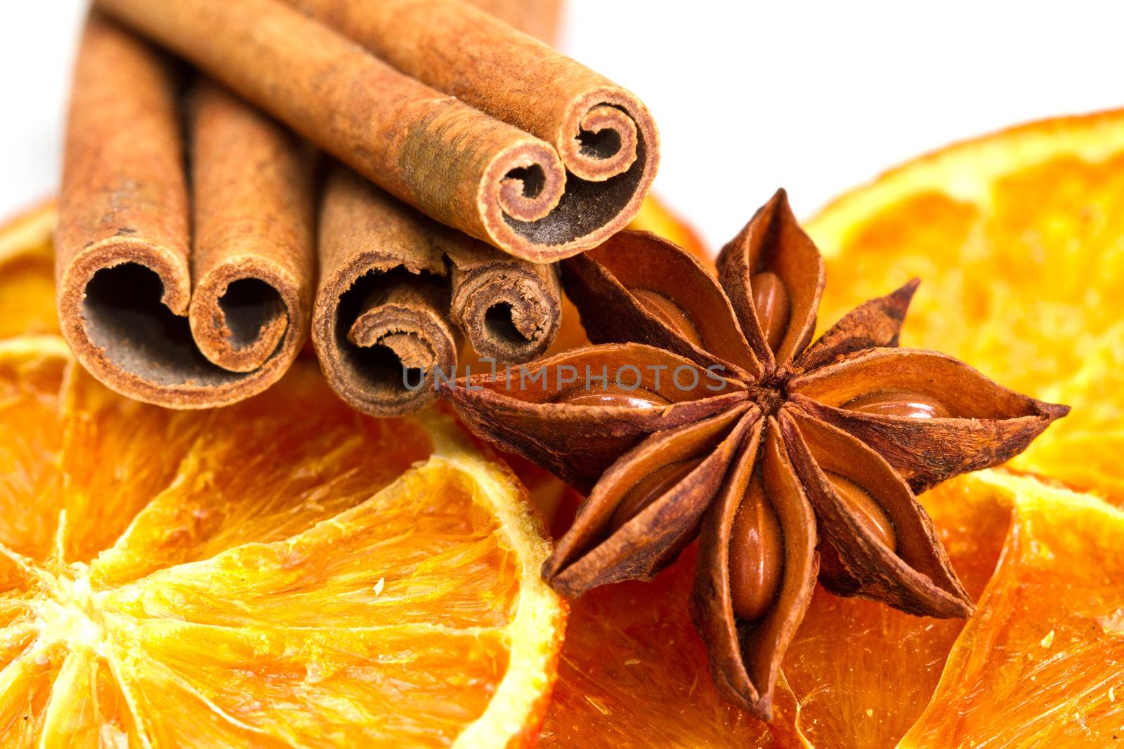 Cinnamon sticks, star anise and dried orange cuts 