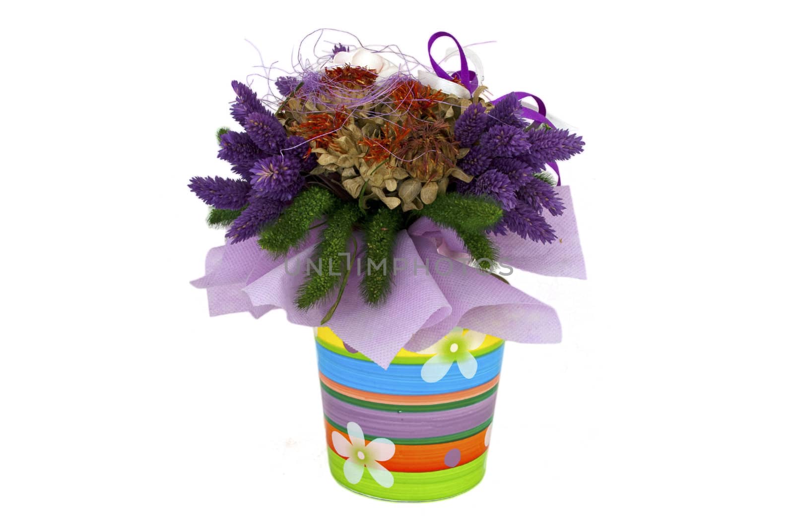 A decorative dried flower bouquet in a colorful pot by renegadewanderer