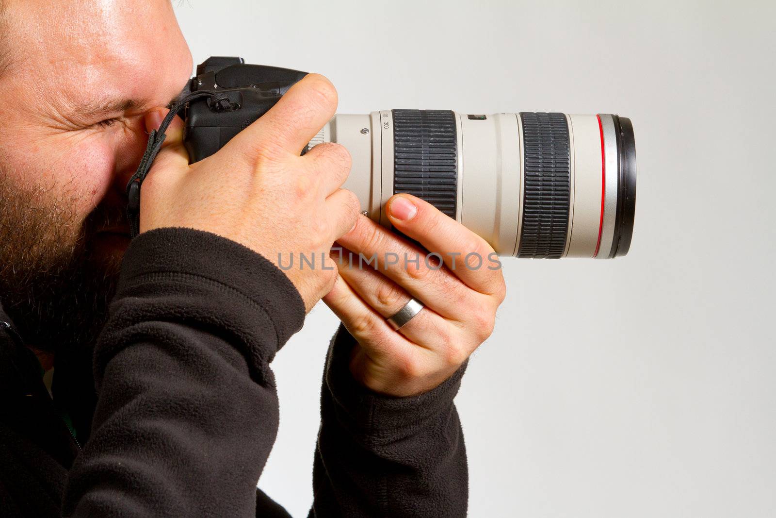 Photographer and Camera by joshuaraineyphotography