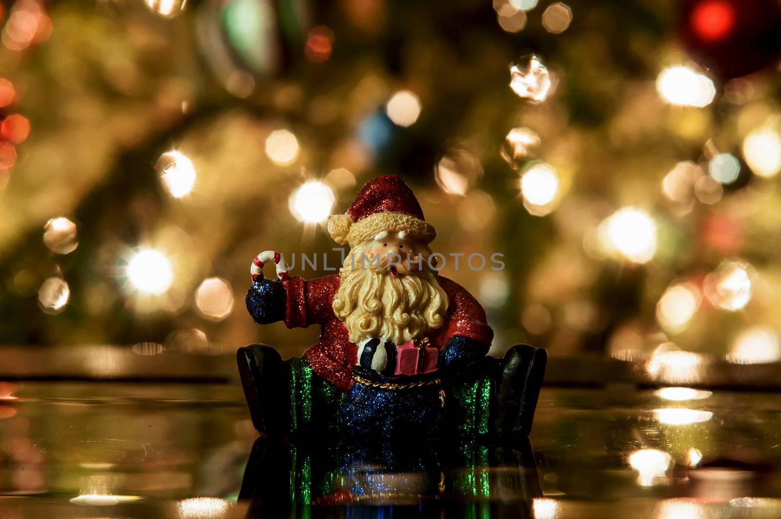 Festive santa with Christmas light background