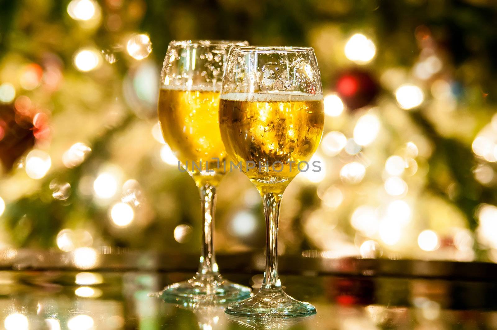 Two champagne glasses ready to bring in the New Year by digidreamgrafix