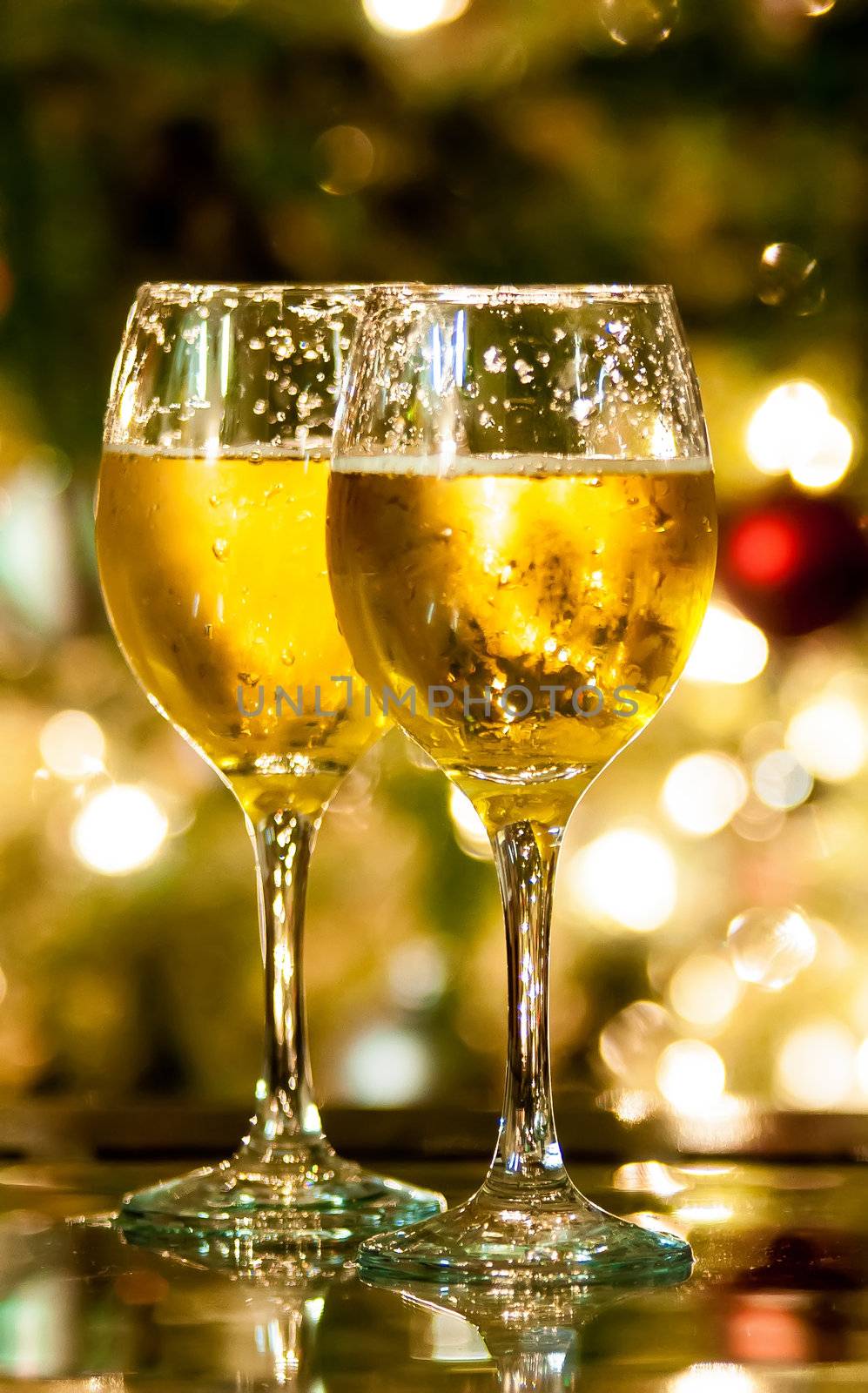 Two champagne glasses ready to bring in the New Year by digidreamgrafix