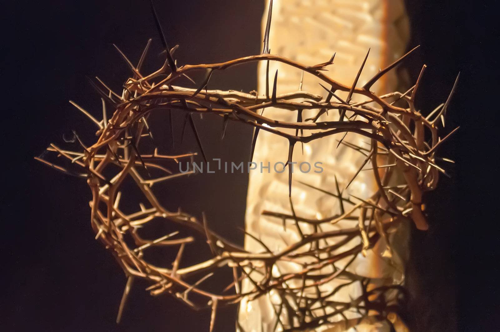 Crown of thorns hung around the Easter cross