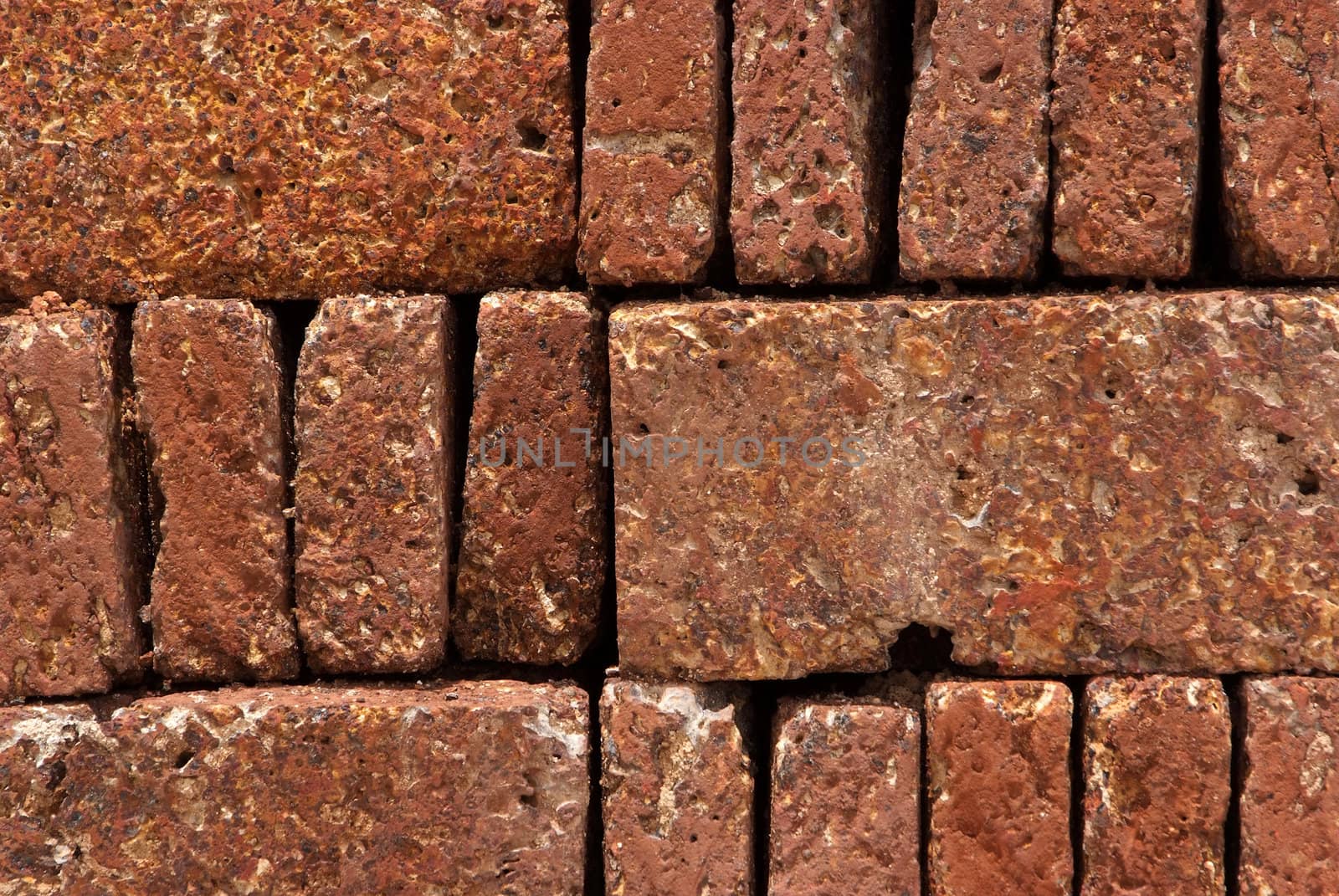 Pattern, Texture, Background of Red-brown Laterite bricks.