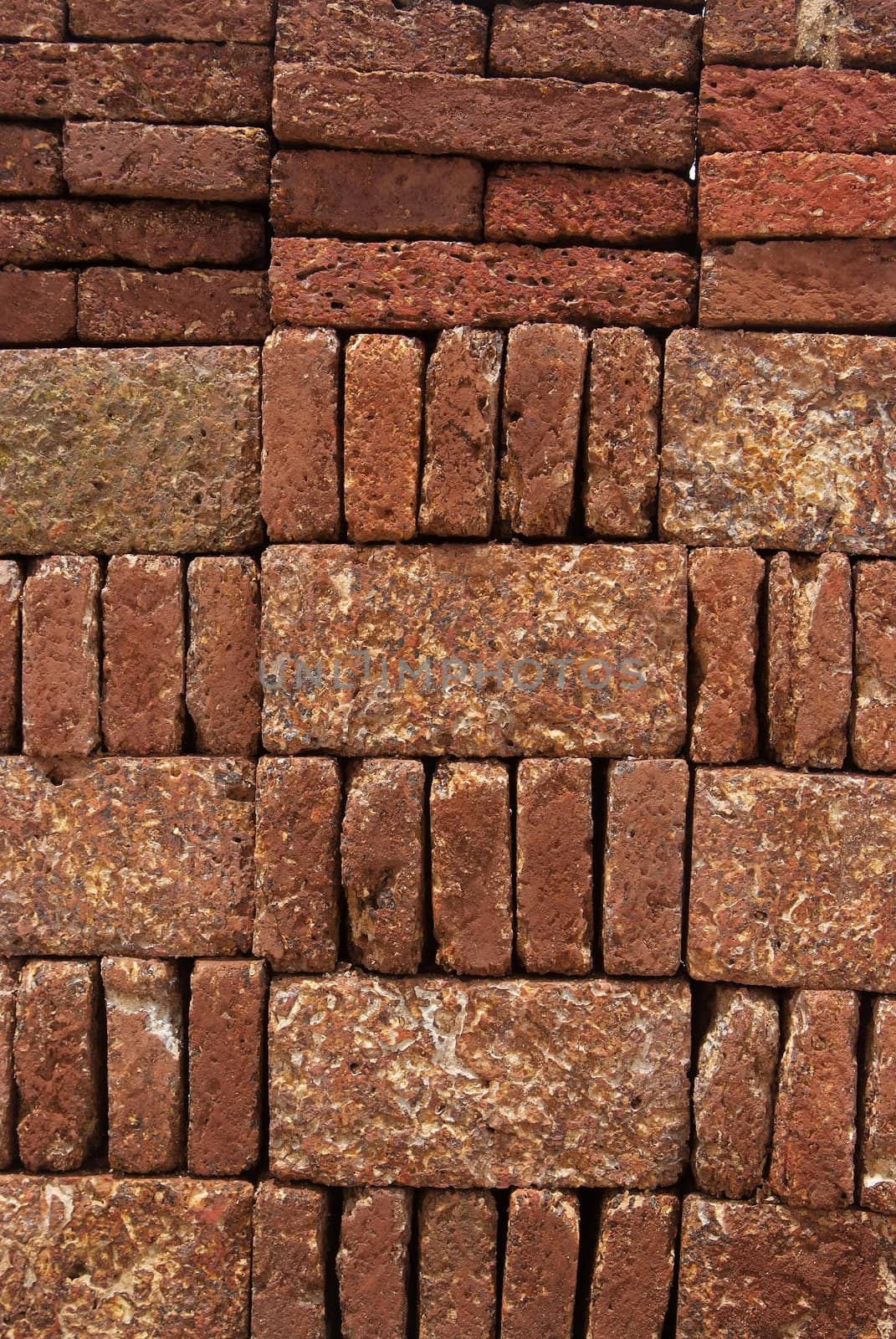 Pattern, Texture, Background of Red-brown Laterite bricks.