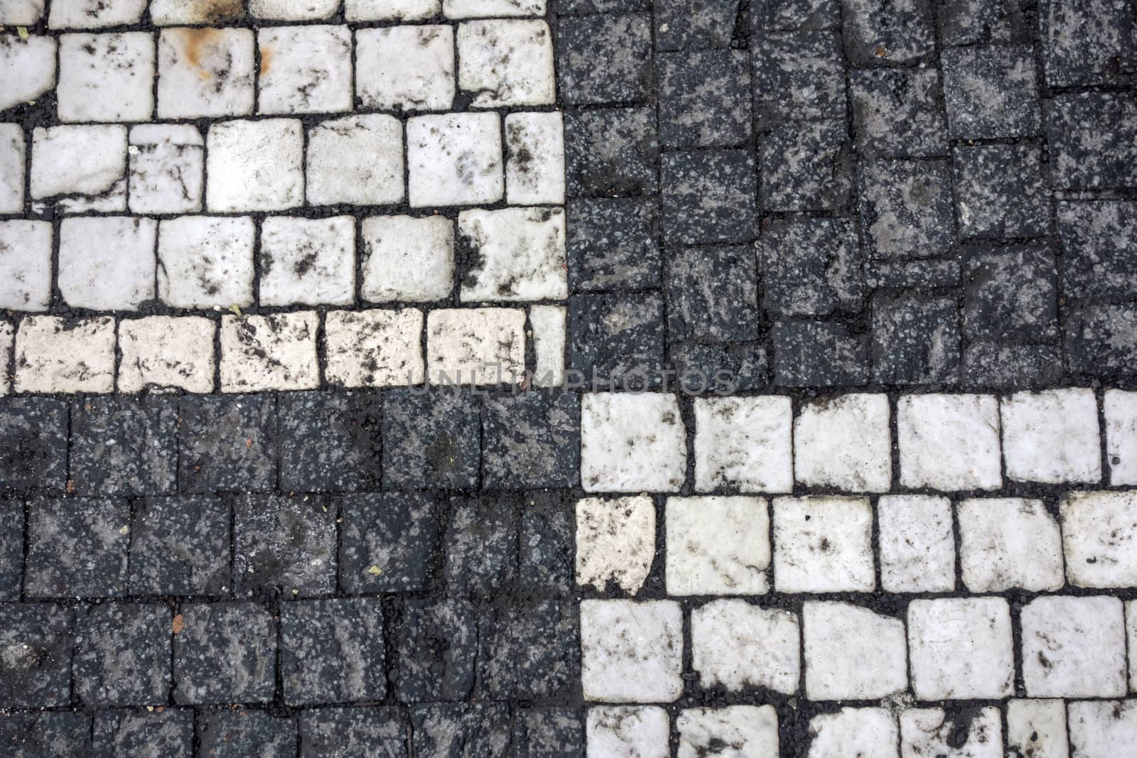 Texture of black andwhite stone structure road in Prague 