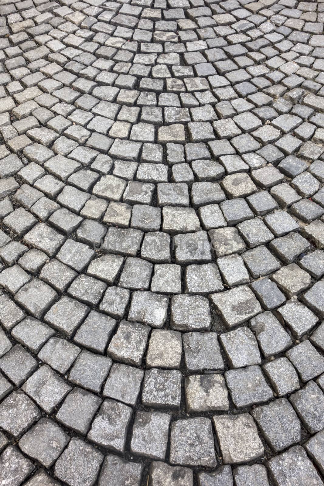 Texture of small stone structure road in Prague