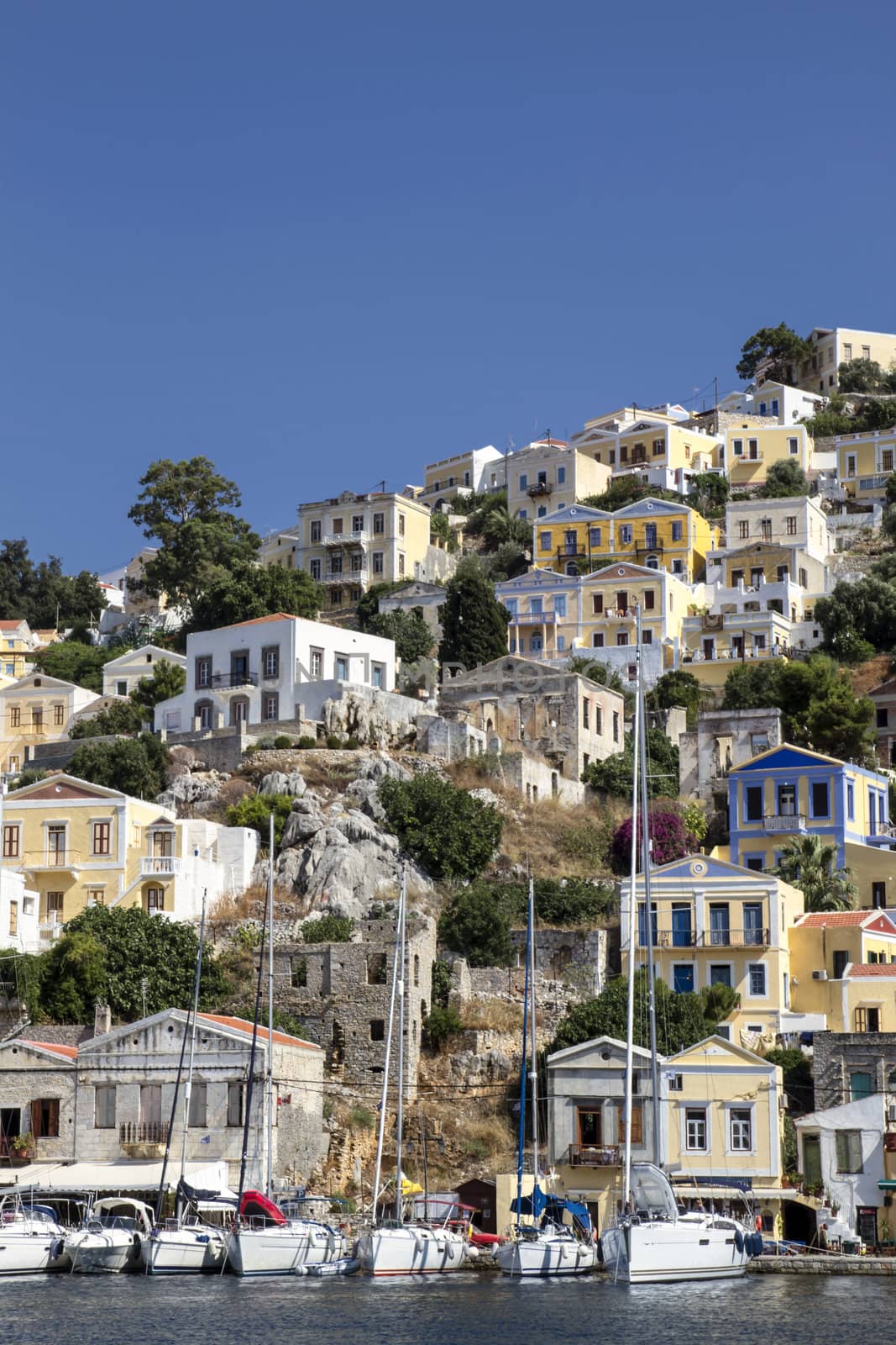 Landscape of colorful houses on symi island, , Greece