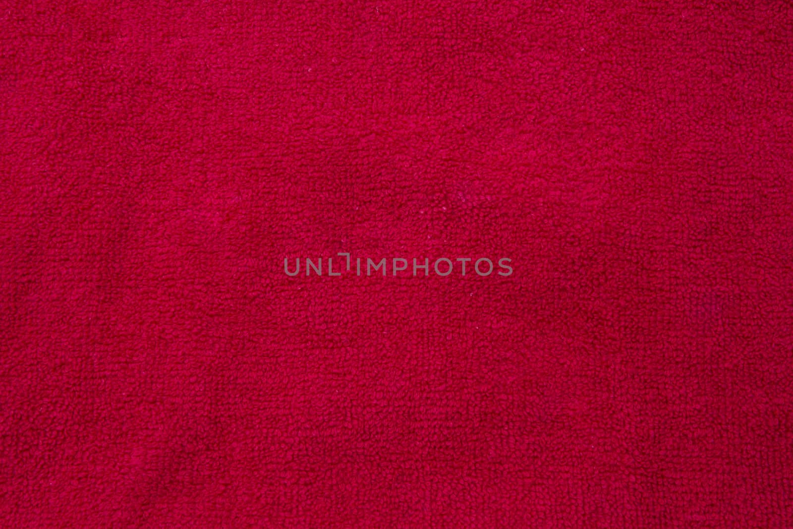 Background of red towel closeup