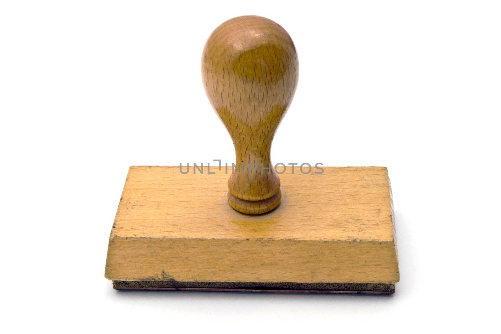 Old wooden stamp isolated on white background 

