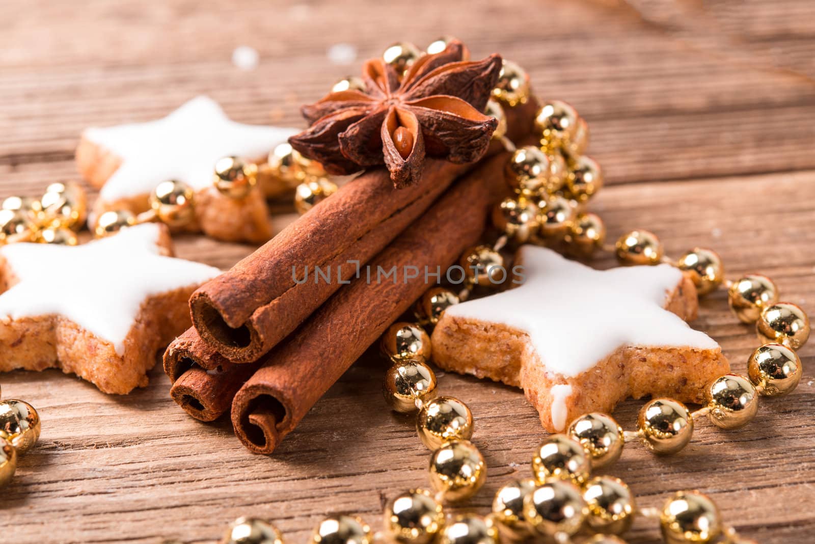 cinnamon sticks and Christmas cake by Darius.Dzinnik