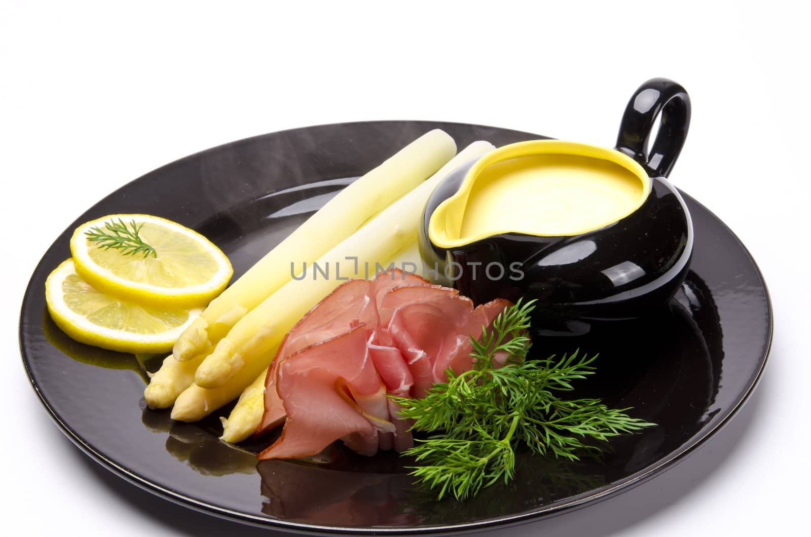 Asparagus, ham and sauce hollandaise by Darius.Dzinnik