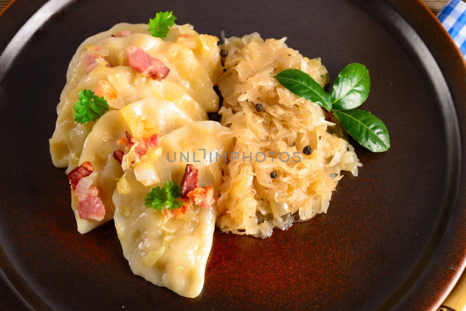 Pierogi.Polish  dish pierogi with sauerkraut and mushrooms by Darius.Dzinnik