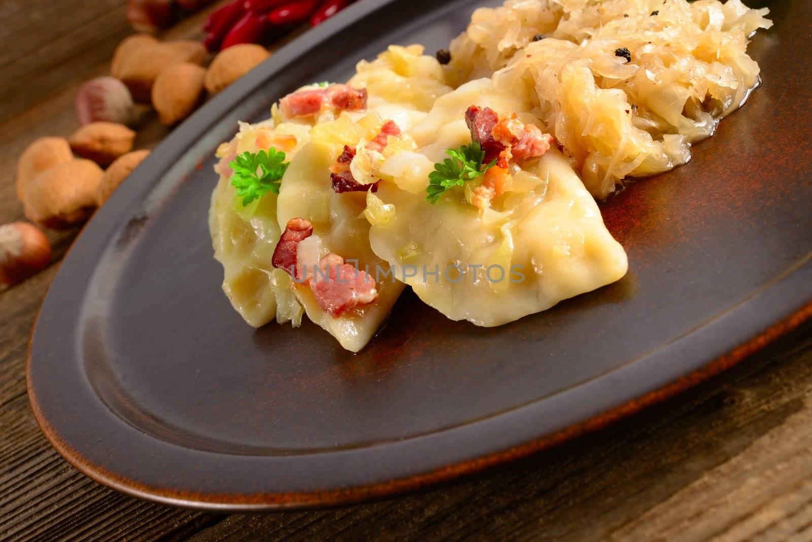 Pierogi.Polish  dish pierogi with sauerkraut and mushrooms by Darius.Dzinnik