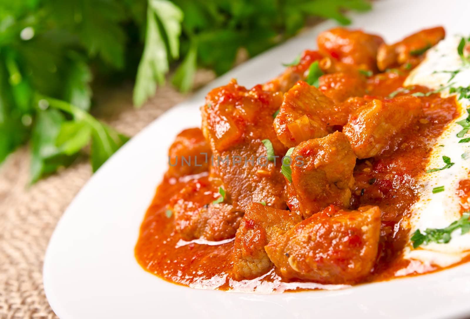 Hungarian goulash with potato pancakes