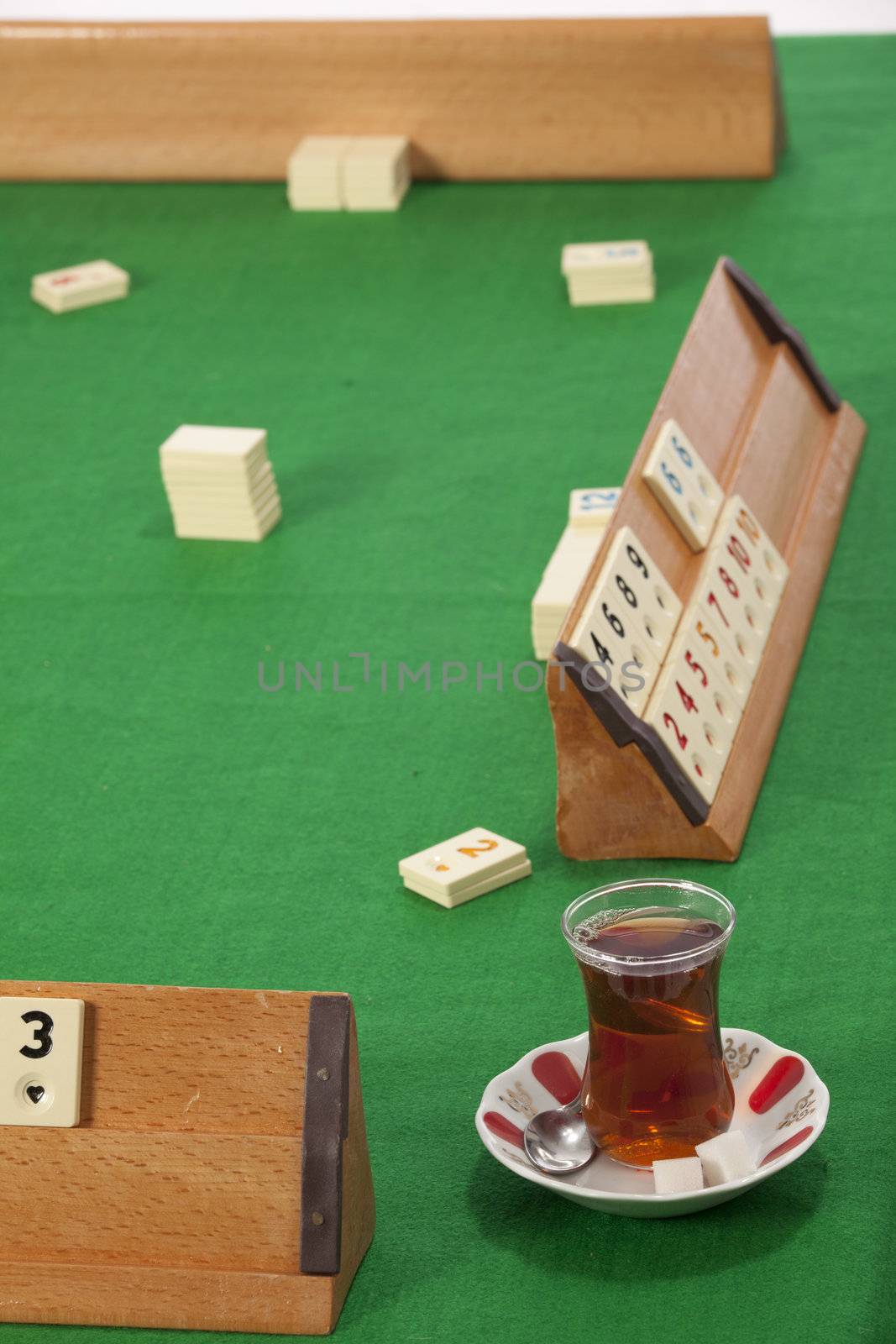 empty  rummy table over green background