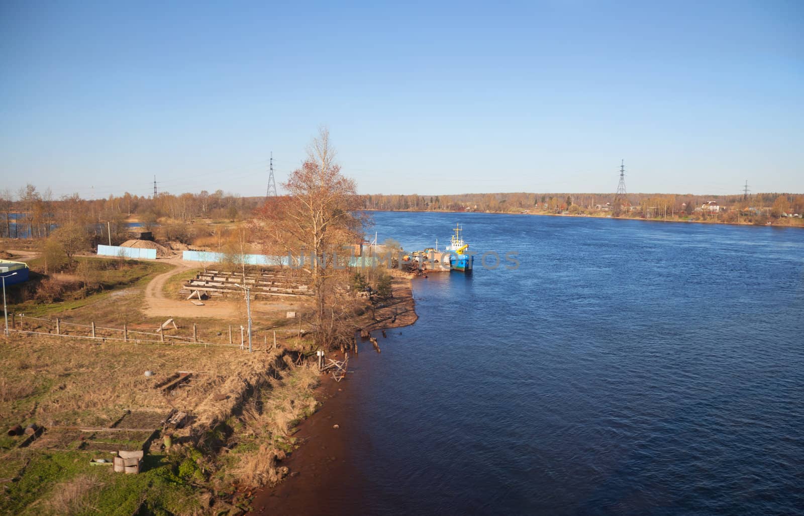 River view from the train window. The Neva River. Kuzminski bridge. Russia.