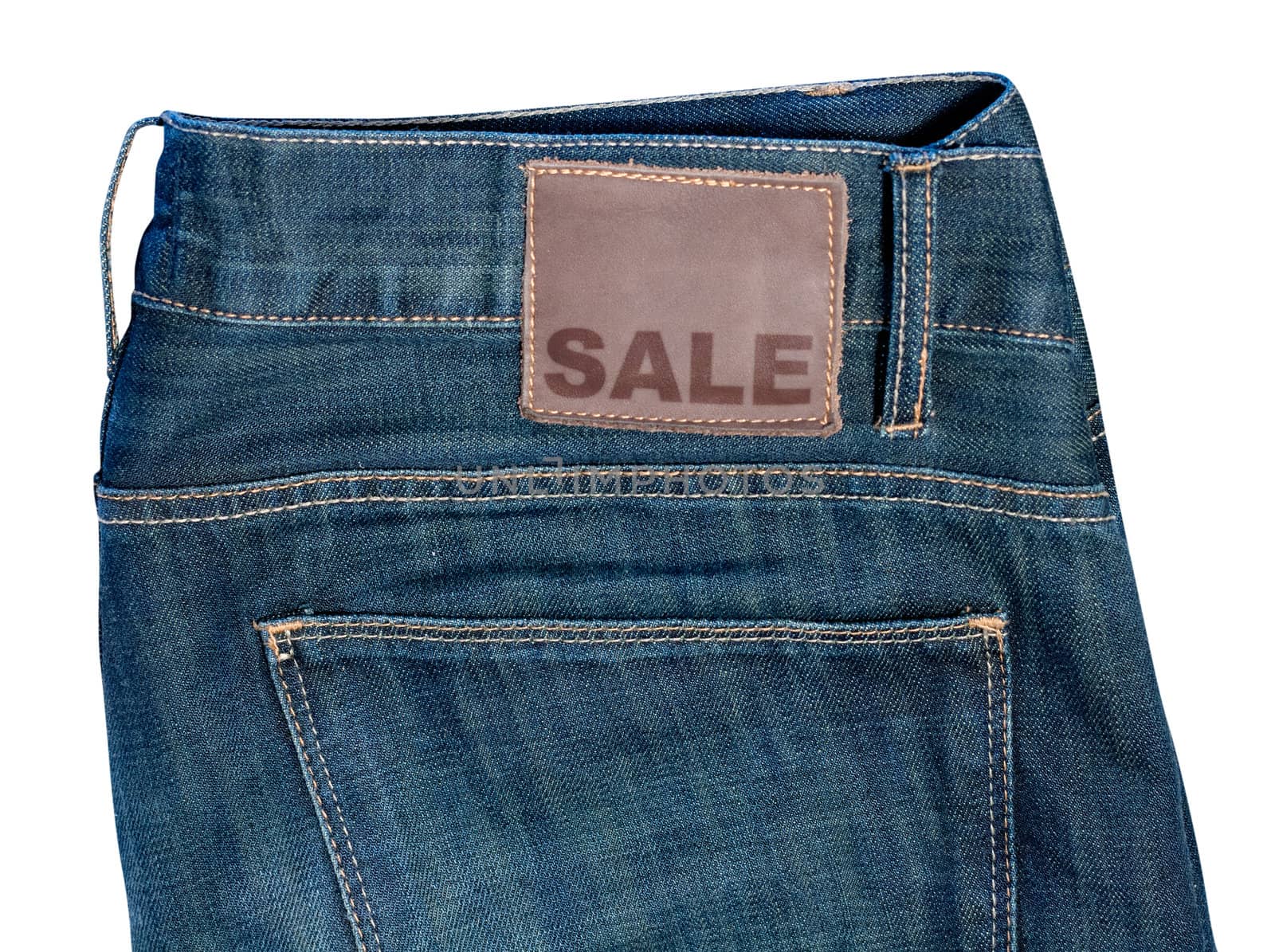 Sale - Pocket of Jeans With Sale Sign on Badge