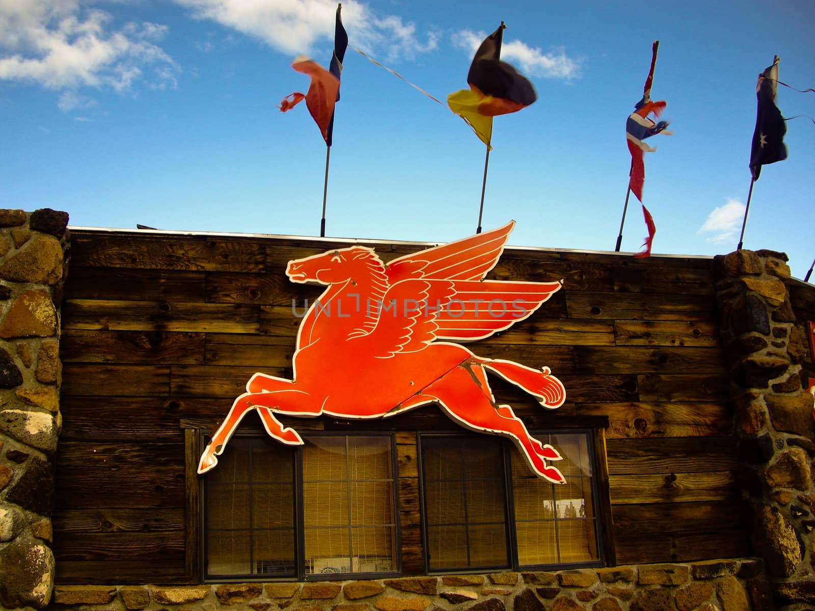 ROUTE 66, ARIZONA/USA - DECEMBER 30: Famous Mobile Oil Flying Horse sign at gas station shown on December 30, 2012 in Arizona's historic Route 66