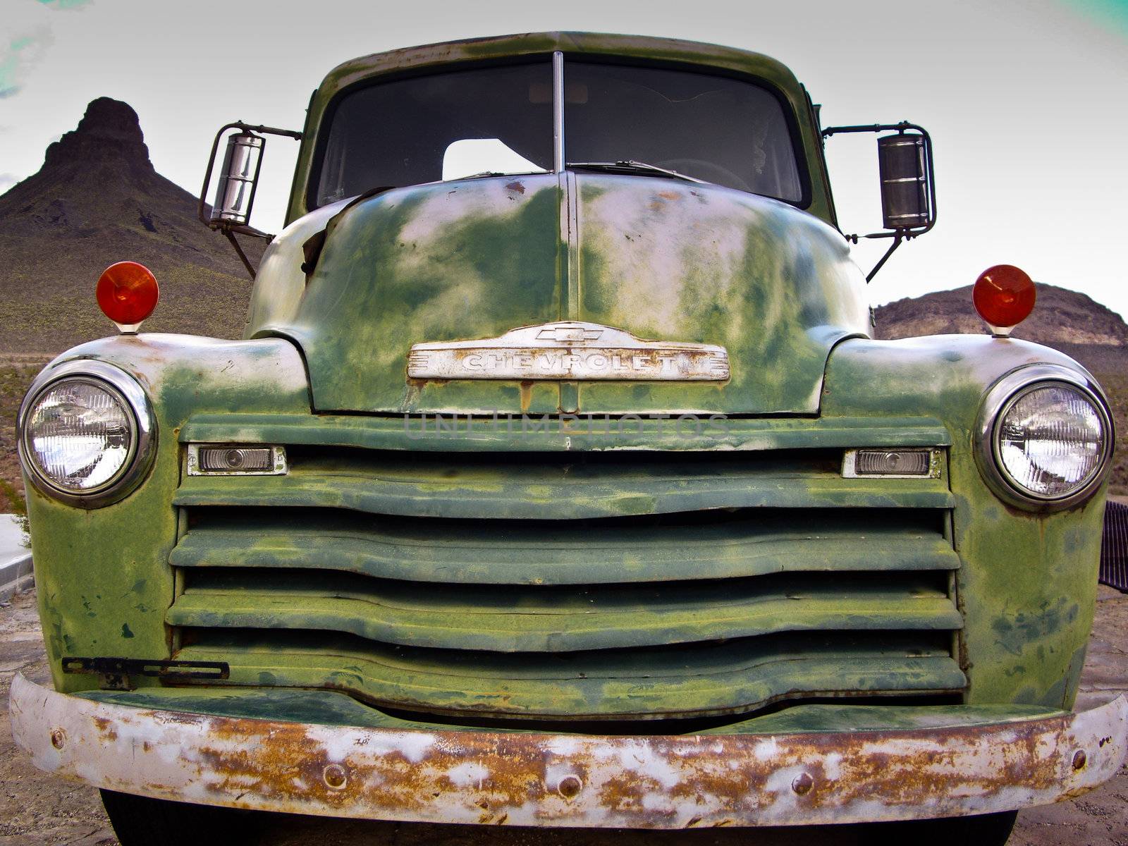 ROUTE 66, ARIZONA/USA - DECEMBER 30: Vintage green Chevrolet truck at gas station shown on December 30, 2012 in Arizona's historic Route 66