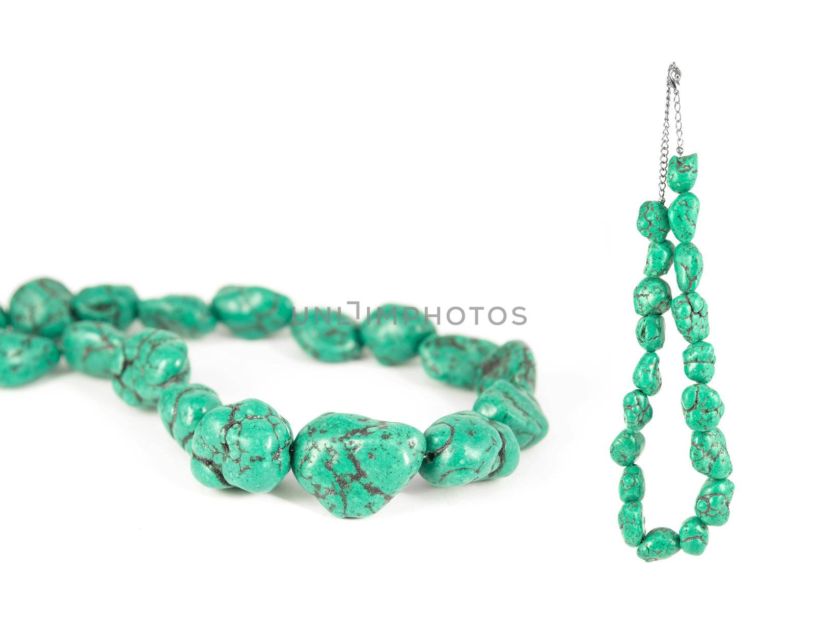 Lovely green turquoise necklace isolated on pure white background. Copy-space.