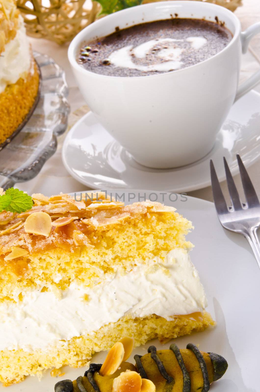 flat cake with an almond and sugar coating and a custard or cream filling