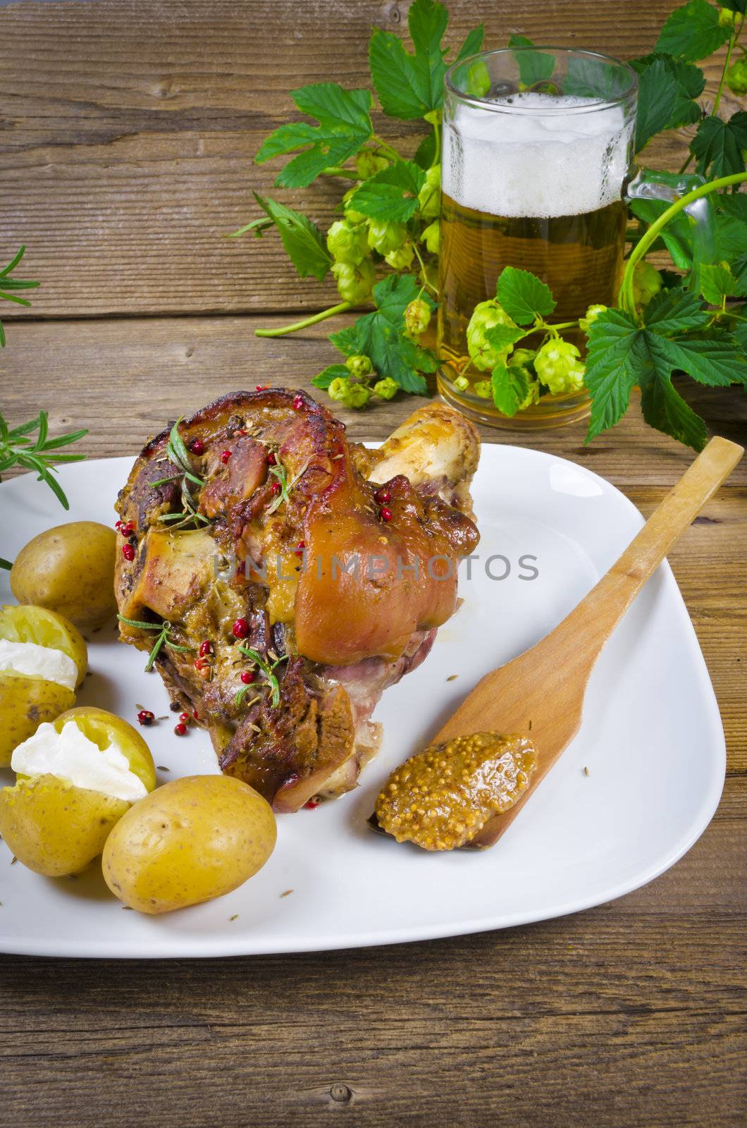 Roasted pork knuckle. Ham and bacon are popular foods in the west, and their consumption has increased with industrialisation.