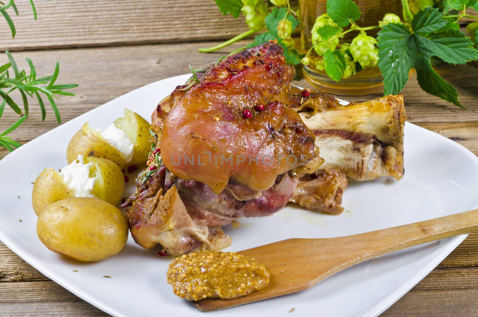 Roasted pork knuckle. Ham and bacon are popular foods in the west, and their consumption has increased with industrialisation.