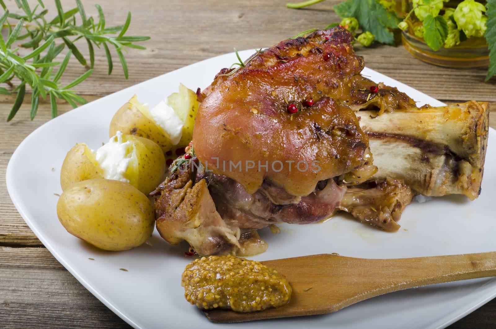 Roasted pork knuckle. Ham and bacon are popular foods in the west, and their consumption has increased with industrialisation.