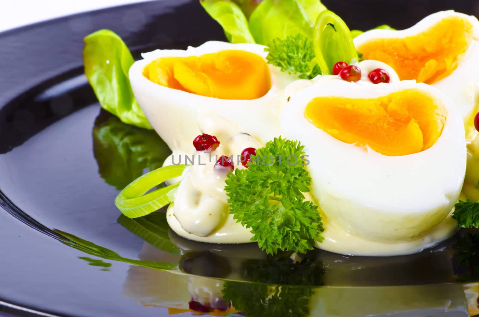 Boiled eggs are eggs (typically chickens' eggs) cooked by immersion in boiling water with their shells unbroken.