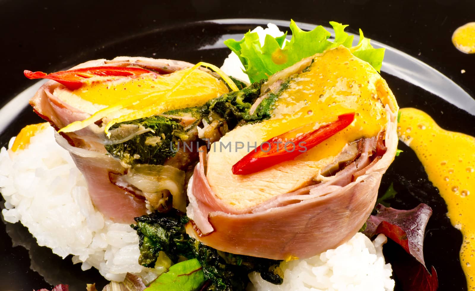 Salmon in ham covers and spinach by Darius.Dzinnik