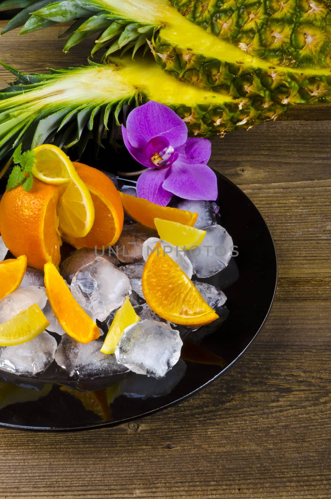 Citrus fruits and ice by Darius.Dzinnik