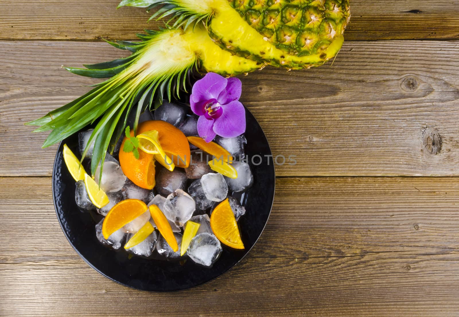 Citrus fruits and ice by Darius.Dzinnik