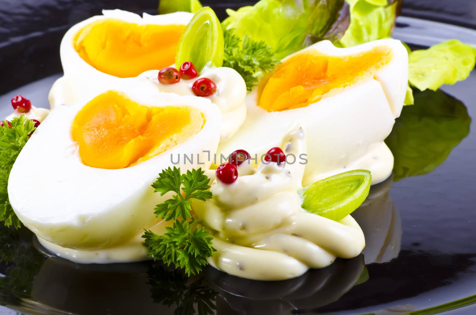 Boiled eggs are eggs (typically chickens' eggs) cooked by immersion in boiling water with their shells unbroken.