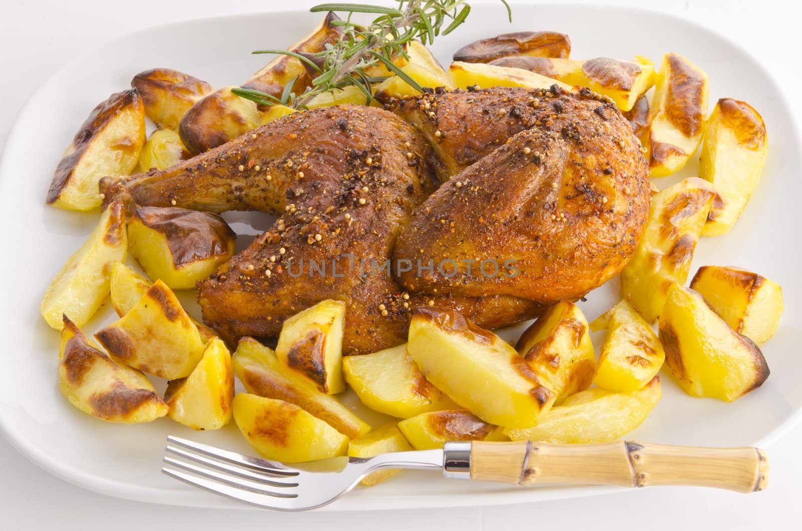 chickens roast with baking potatoes by Darius.Dzinnik