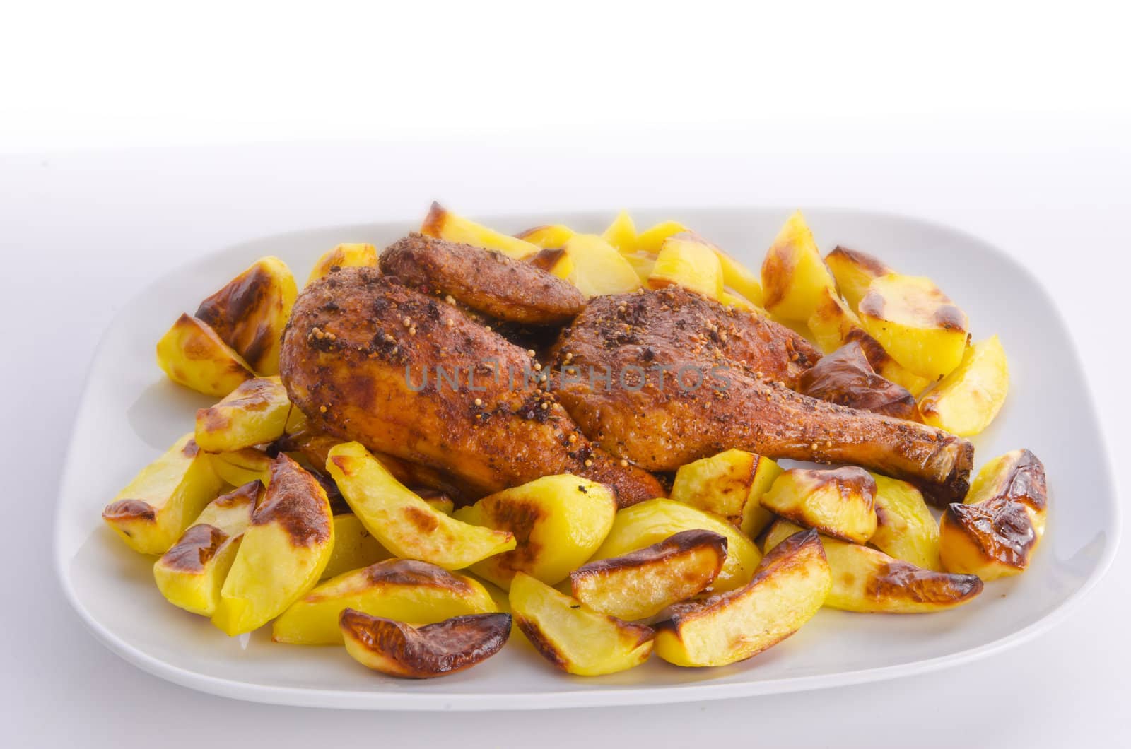 chickens roast with baking potatoes by Darius.Dzinnik