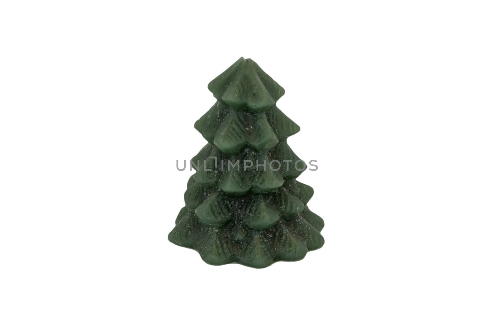 A green candle in the shape of a pine isolated on white