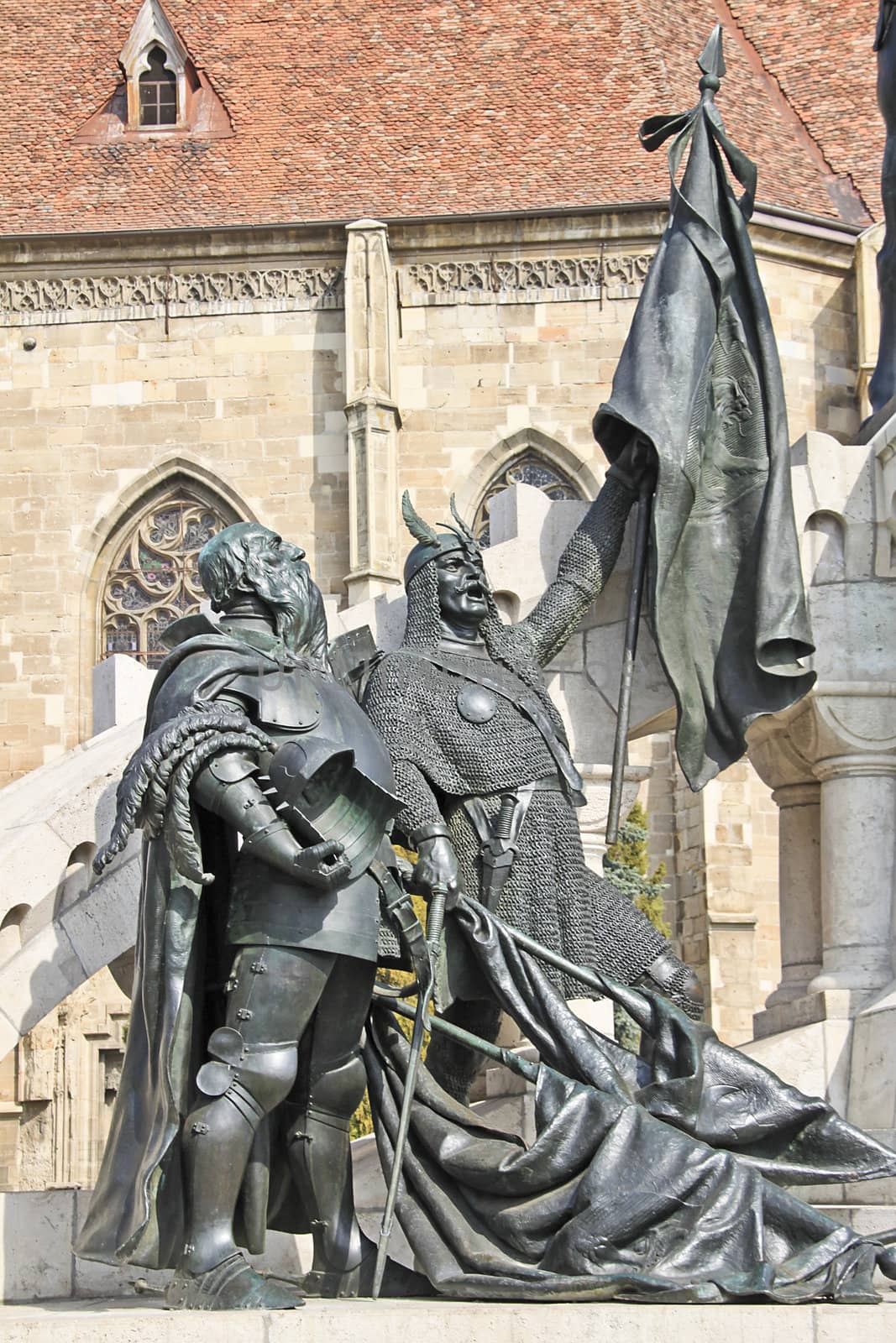 Closeup of two minor characters of the statue in Cluj-Napoca, Romania