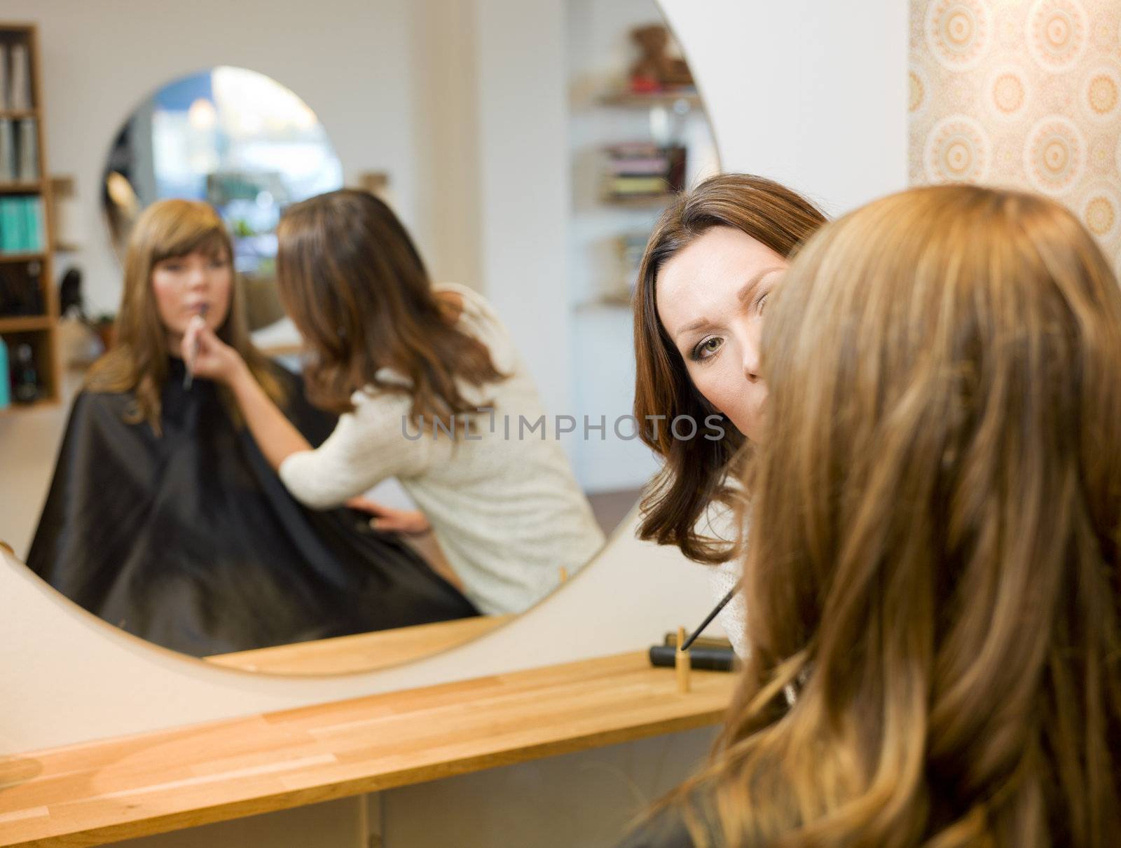 Women in beauty salon by gemenacom