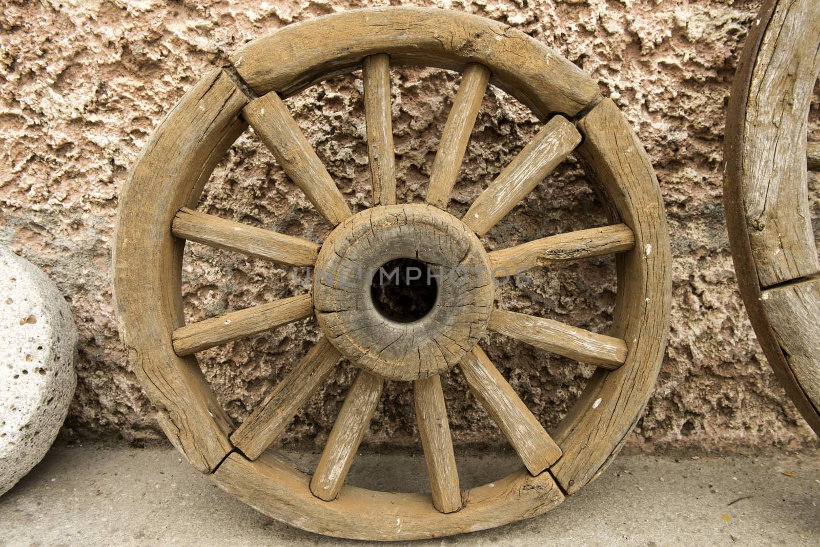 The old wooden cart wheel.  Made in Crete, Greece.
