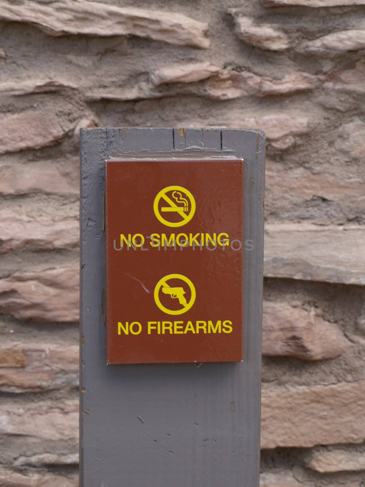 No smoking and no firearms sign