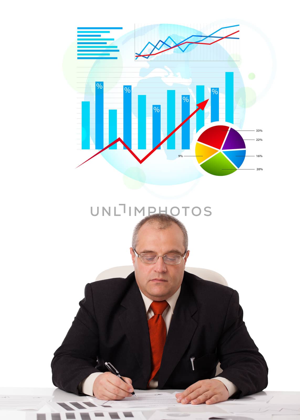 Businessman sitting at desk with statistics, isolated on white