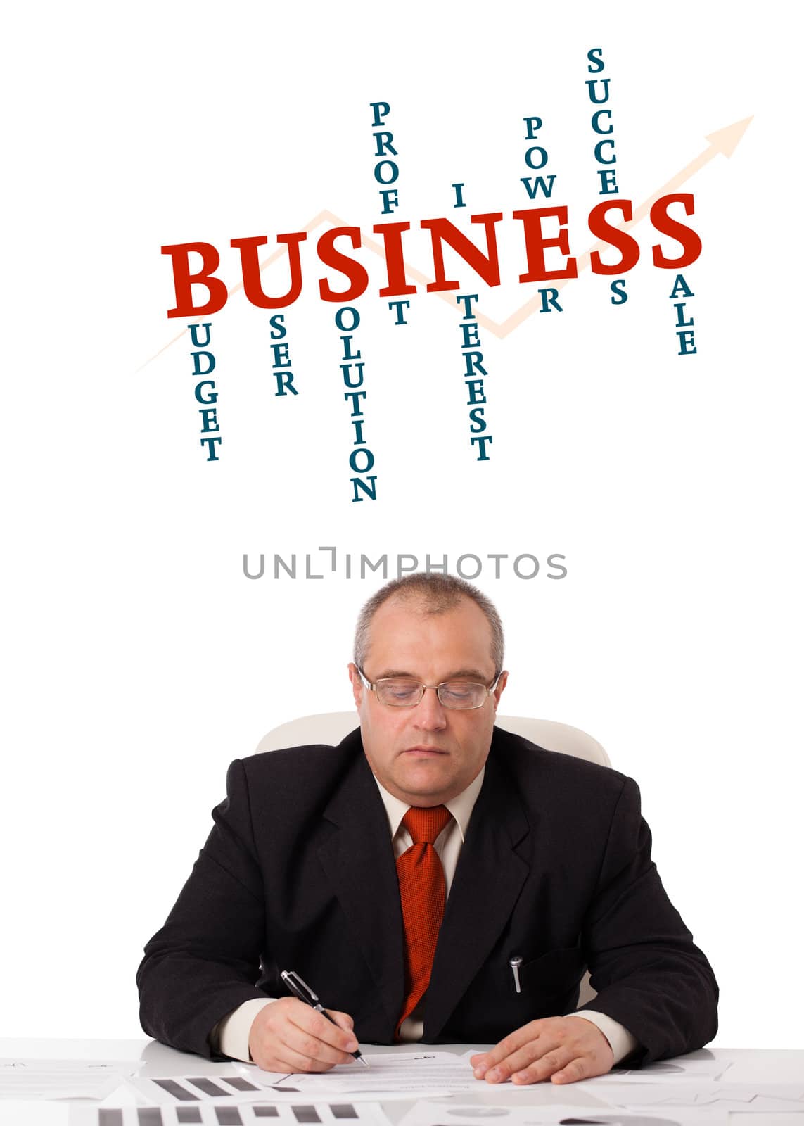 businessman sitting at desk with word cloud, isolated on white