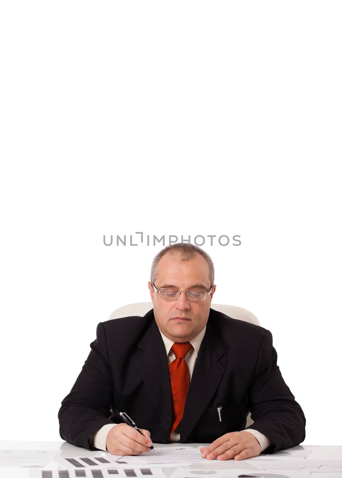 businessman sitting at desk with copy space, isolated on white