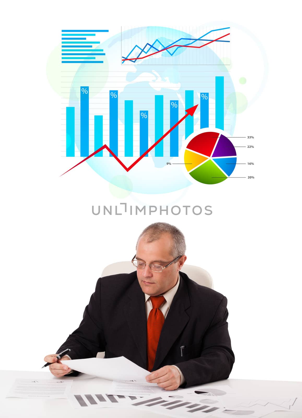 Businessman sitting at desk with statistics, isolated on white