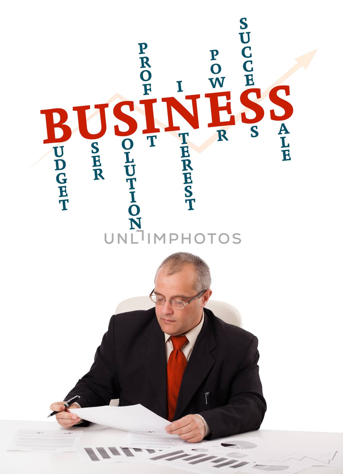 businessman sitting at desk with word cloud, isolated on white