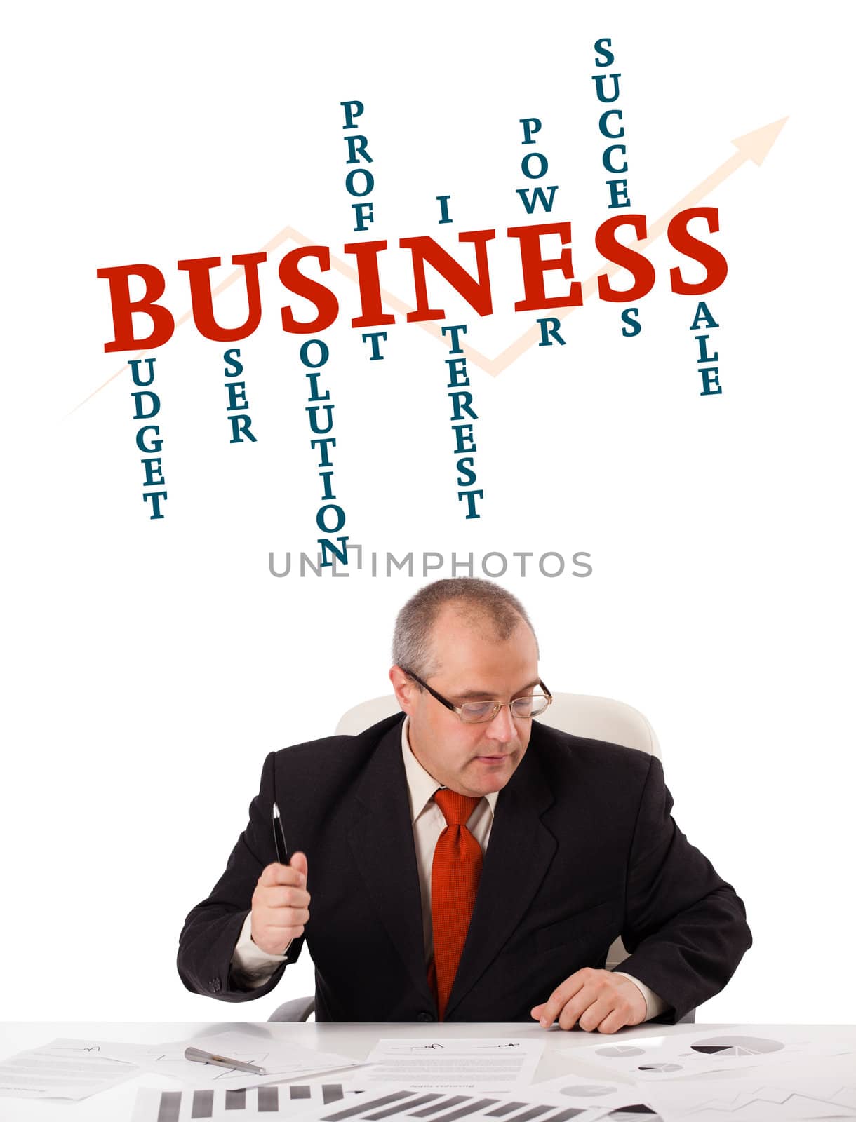 businessman sitting at desk with word cloud by ra2studio