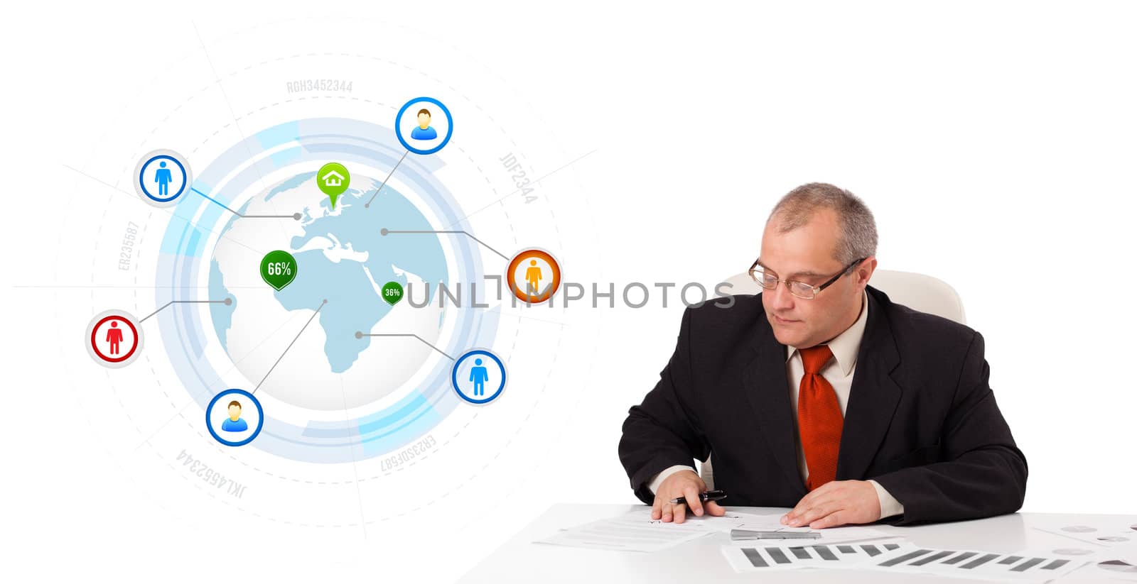 businessman sitting at desk with a globe and social icons, isolated on white