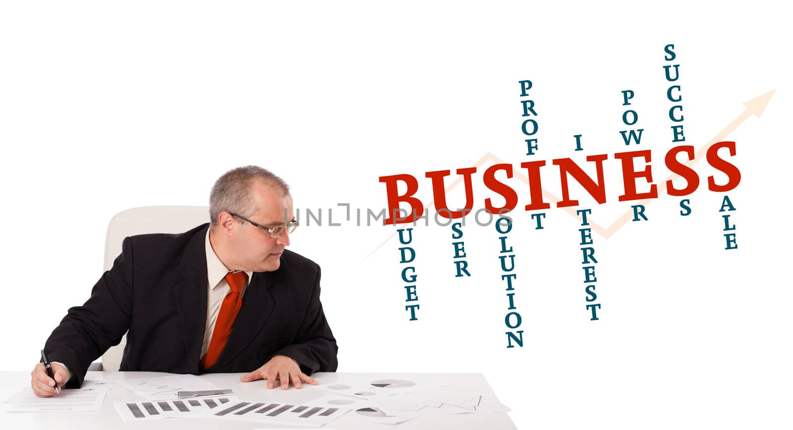 businessman sitting at desk with word cloud, isolated on white